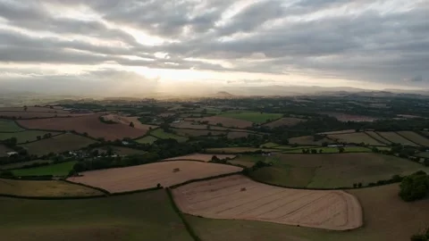 Sunset of Fields and Farms over Devon from a drone, Torquay, Torbay, Devon, UK Vidéo 315039753