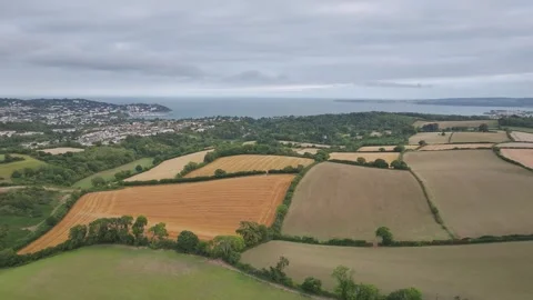 Sunset of Fields and Farms over Devon from a drone, Torquay, Torbay, Devon, UK Vidéo 315039780