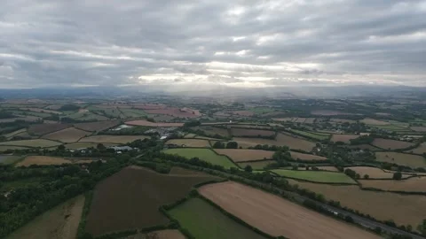 Sunset of Fields and Farms over Devon from a drone, Torquay, Torbay, Devon, UK Stock-Footage 315039788