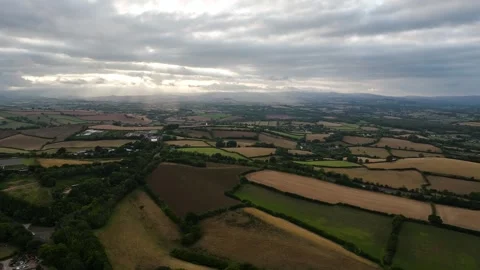 Sunset of Fields and Farms over Devon from a drone, Torquay, Torbay, Devon, UK Stock-Footage 315039836