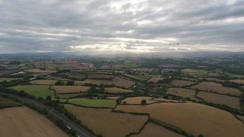 Sunset of Fields and Farms over Devon from a drone, Torquay, Torbay, Devon, UK Stock-Footage 315039853