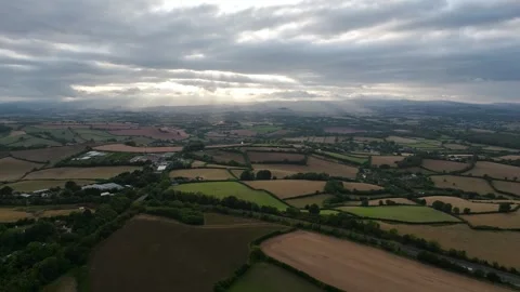 Sunset of Fields and Farms over Devon from a drone, Torquay, Torbay, Devon, UK Stock-Footage 315039856