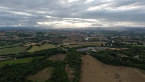 Sunset of Fields and Farms over Devon from a drone, Torquay, Torbay, Devon, UK Stock-Footage 315039888