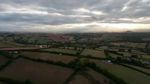 Sunset of Fields and Farms over Devon from a drone, Torquay, Torbay, Devon, UK Stock-Footage 315039958