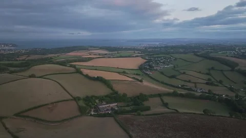 Sunset of Fields and Farms over Devon from a drone, Torquay, Torbay, Devon, UK Stock-Footage 315050079