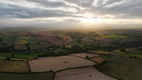 Sunset of Fields and Farms over Devon from a drone, Torquay, Torbay, Devon, UK Stock-Footage 315050110