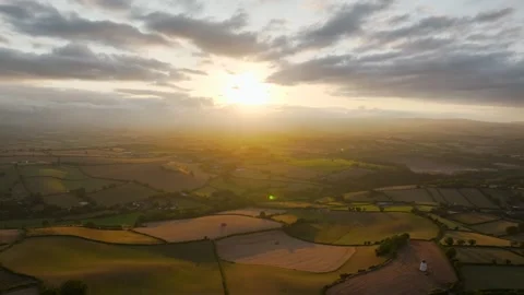 Sunset of Fields and Farms over Devon from a drone, Torquay, Torbay, Devon, UK Stock-Footage 315050125