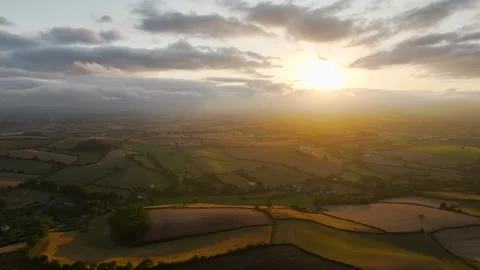 Sunset of Fields and Farms over Devon from a drone, Torquay, Torbay, Devon, UK Stock-Footage 315050143