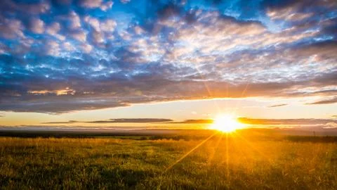 Sunset in the fields Stock Photos