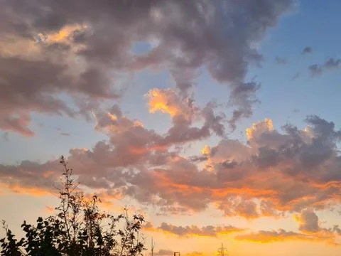 Sunset fiery clouds. Stock Photos