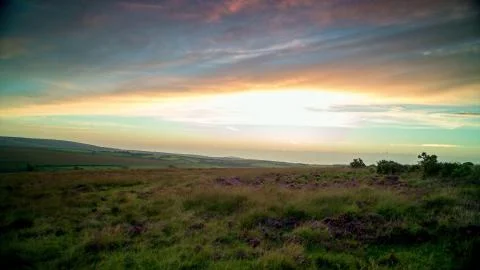 Sunset on a flat ground Stock Photos