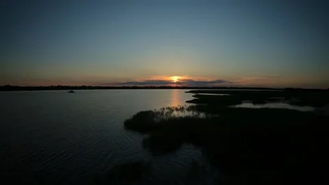 Sunset Flight - Coastal River Marsh Video stock 155077189
