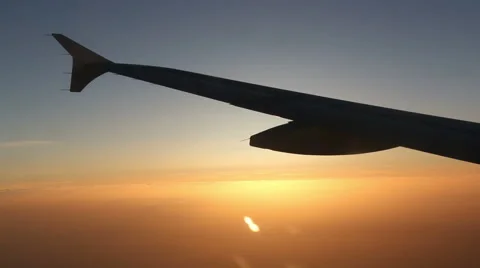 Sunset flight with gleaming sun Stock Footage 42956288