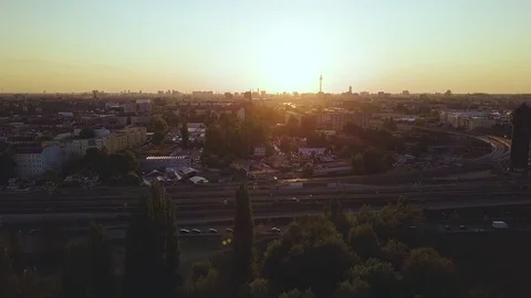 Sunset flight over Berlin at "Rummelsburger Bucht" towards the city centre Stock-Footage 75827225