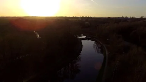 Sunset Flight Over A Canal Stock Footage 89179774