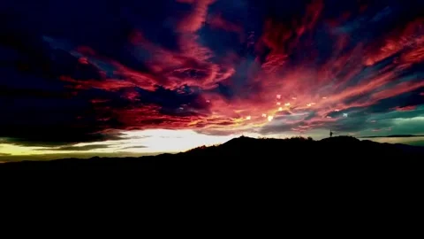 Sunset Flight Over Crimson Mountains Video stock 325329449