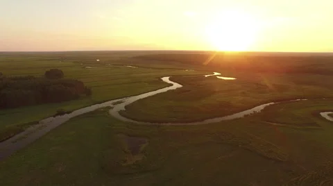 A sunset flight over a meandric river Video stock 63654170