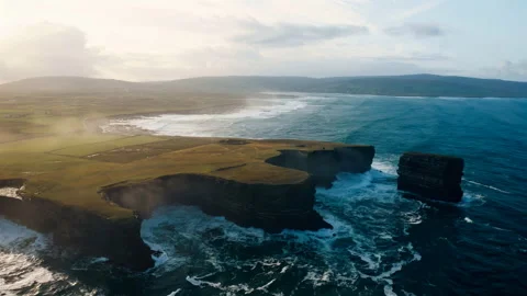 Sunset flight over mountains and ocean Stock Footage 297120185