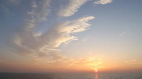 Sunset floating clouds over the sea. Stock Footage 44431001