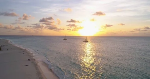 Sunset fly out from water to waves and beach Stock-Footage 97174448