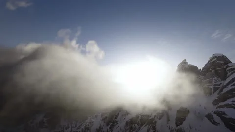 Sunset fly over cloud snow mountain Video stock 267318735