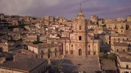 Sunset Flying Counter Clockwise Around San Giorgio Cathedral In Modica Stock Footage