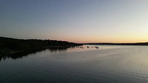 Sunset flying over the lake. Stock Footage 208926648