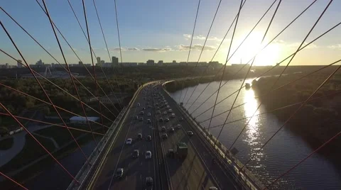 Sunset flying under the bridge Stock Footage 55627849