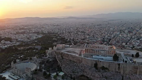 Sunset Flyover of Acropolis of Athens with Parthenon and Odeon Stock Footage 342019341