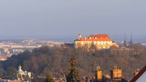 Sunset footage with medieval castle in front of modern city, Czech Republic. Stock Footage 128343671