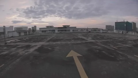 Sunset FPV Drone Flyaround Over Kuala Lumpur Rooftop Parking 02 Stock Footage 303755015