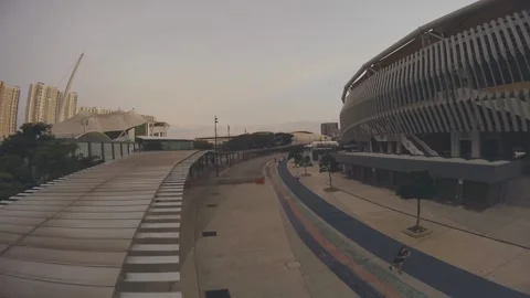 Sunset FPV Flyaround of Kuala Lumpur's Modern Sport Arena - Iconic Cityscape 02 Stock Footage 303755014