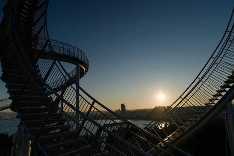 Sunset Framed By Curved Skywalk Structure Stock Photos