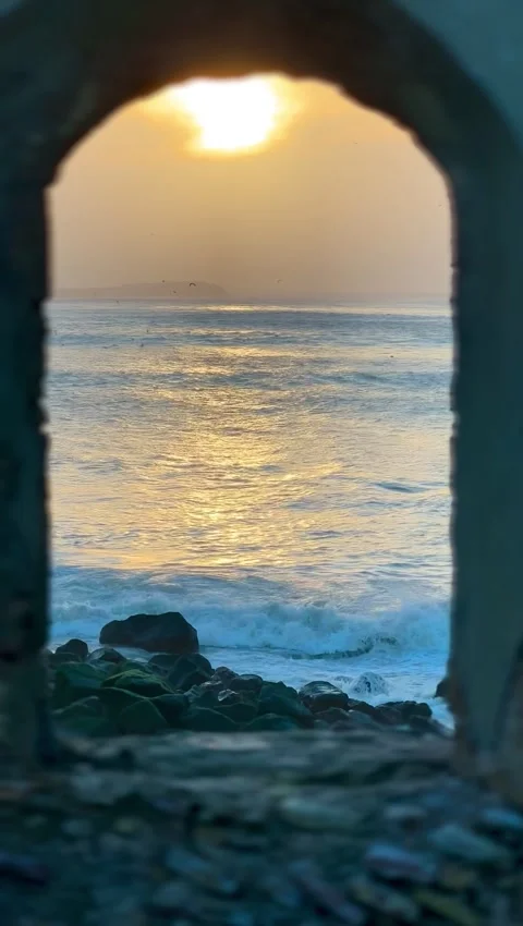 Sunset framed through Kasbah window overlooking Sebou River Kenitra Stock Footage 342454360