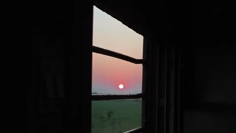 Sunset Framed by Train Window Bars Rail Journey Stock Footage 323902913