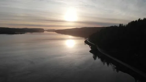 Sunset Freshwater Lake Reflection Cloudy Day, Silhouette Forest, Aerial Stock-Footage 149941377