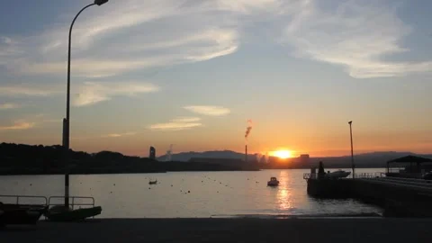 Sunset in front of aluminium factory Stock Footage 273974971