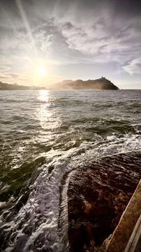Sunset in front of the bay Stock Photos
