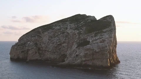 Sunset in front of the ocean end a big lone island Stock Footage 243261374