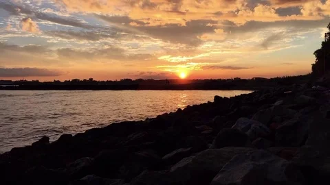 Sunset in front of the river time lapse Stock Footage 71031373