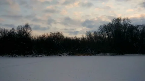 Sunset at the frozen river Stock Footage 101545779