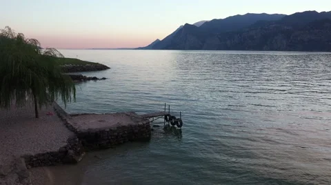 Sunset on the Garda Lake between Mountais, Italy. Stock Footage 68644885