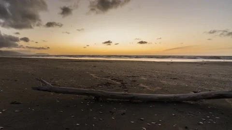 Sunset with gentle movement at an nice beach near Wellington, New Zealand, 4k Stock Footage 231931665