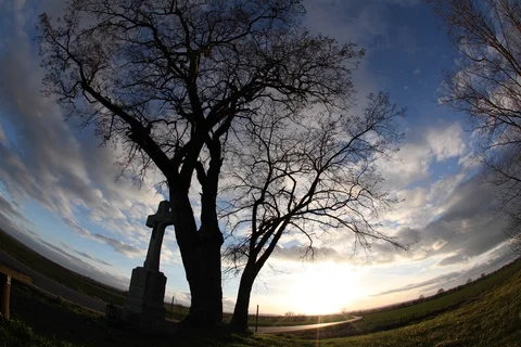 Sunset Germany with clouds, trees and wayside shrine. Timelapse Video stock 111630466