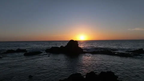 Sunset Glimmer on Ocean Breeze with Dramatic Rock Silhouettes – Gran Canaria Stock Footage 309945716