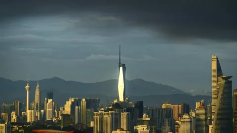 Sunset glow and the stunning reflection of the PNB118 building. Nature's ar.. Stock Footage 248838117