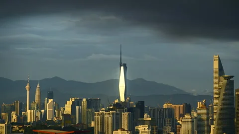 Sunset glow and the stunning reflection of the PNB118 building. Nature's ar.. Stock Footage 248838120