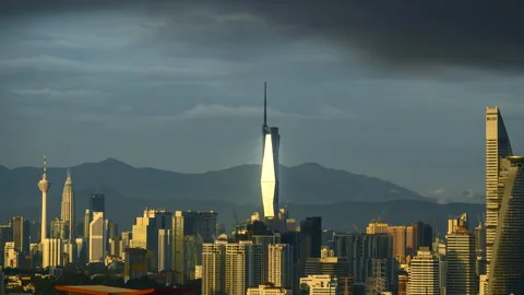 Sunset glow and the stunning reflection of the PNB118 building. Nature's ar.. Stock Footage 248838121