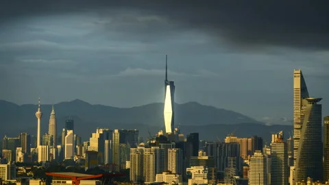 Sunset glow and the stunning reflection of the PNB118 building. Nature's ar.. Stock Footage 248838126