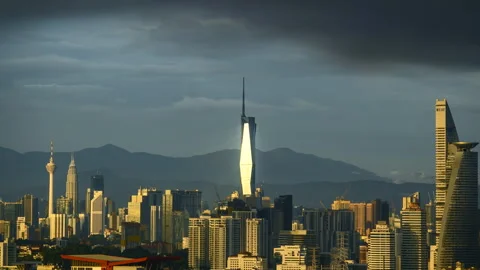 Sunset glow and the stunning reflection of the PNB118 building. Nature's ar.. Stock Footage 248838135